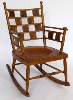 Lot 432 - Aesthetic Movement rocker.