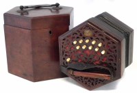 Lot 25 - Lachenal cased concertina 21 key.