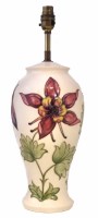 Lot 94 - Moorcroft lamp and shade.