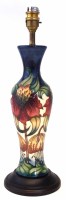 Lot 95 - Moorcroft lamp and shade.