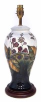 Lot 96 - Moorcroft lamp and shade.