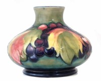 Lot 99 - Moorcroft autumn leaves vase.