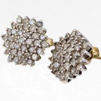 Lot 194 - Pair of diamond cluster earrings