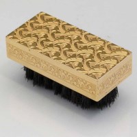 Lot 225 - Boucheron Paris 18ct gold mounted brush
