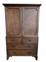 Lot 474 - George III figured mahogany linen press