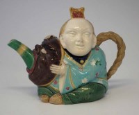 Lot 135 - Majolica tea pot