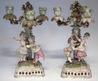 Lot 137 - Pair of Meissen style three branch candelabra