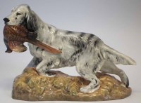 Lot 211 - Royal Doulton setter and pheasant.
