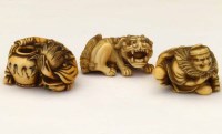 Lot 229 - Two ivory netsukes of crouching figures and