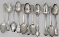 Lot 244 - Four Channel Islands silver table spoons, three