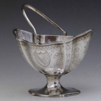 Lot 255 - George III silver sugar basket.