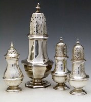 Lot 261 - Octagonal silver caster, pair of silver casters and another (4).