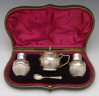 Lot 274 - Cased three-piece condiment set.