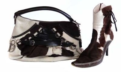 Lot 453 - Christian Dior cowhide bag and matching boots