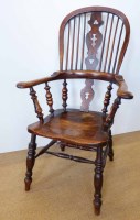 Lot 720 - Victorian oak and elm high back Windsor farmhouse chair