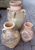 Lot 771 - Three terracotta garden urns.