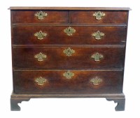 Lot 544 - George III oak chest of two short and three long graduated drawers