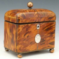 Lot 1 - George III tortoiseshell veneered tea caddy.