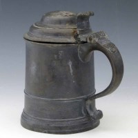 Lot 12 - 18th century pewter tankard.