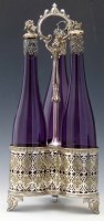 Lot 182 - Three bottle decanter stand.