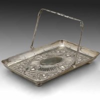 Lot 183 - Silver swing handle dish.