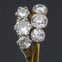 Lot 231 - Two old European cut three-stone diamond rings