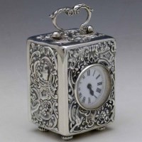 Lot 281 - Silver miniature carriage clock.