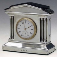 Lot 282 - Silver mantel clock.
