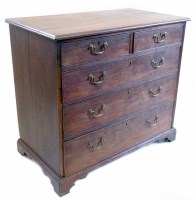 Lot 496 - George III oak chest of two short and three long drawers