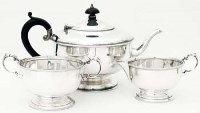 Lot 304 - Silver three piece tea set.