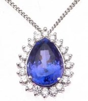 Lot 324 - Tanzanite and diamond pendant on 18ct white gold