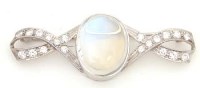 Lot 377 - Moonstone and diamond bow brooch