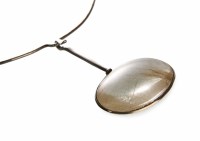 Lot 57 - Georg Jensen Vivianna Torun silver and rutilated quartz pendant