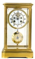 Lot 658 - Four glass mantel clock.