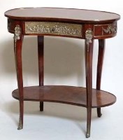 Lot 692 - Kidney shaped table.