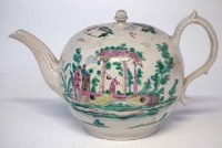 Lot 233 - Staffordshire salt glazed teapot named John