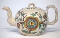 Lot 235 - Staffordshire salt glazed teapot circa 1750