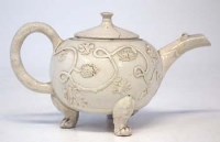 Lot 236 - Staffordshire salt glazed teapot circa 1750