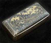 Lot 247 - French niello silver snuff box, circa 1860, decorated on the scale ground with a deer hunt, gilt interior and assay mark on the lip of the lid, width