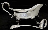 Lot 261 - George III Dublin gravy boat and ladle.