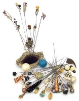 Lot 264 - Collection of approximately 40 hatpins and an EP