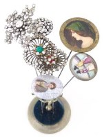 Lot 266 - Five diamante hatpins and three portrait pins in