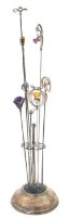 Lot 267 - Eight Charles Horner hatpins in a silver stand