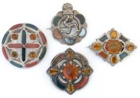 Lot 271 - Four silver and hardstone cloak brooches