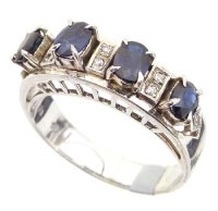 Lot 288 - 18ct white gold ring of four sapphires