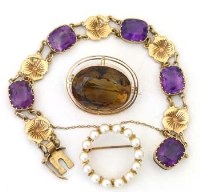 Lot 314 - 9ct gold amethyst bracelet; citrine oval brooch
