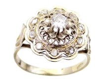 Lot 315 - 18ct white gold diamond floret cluster ring.
