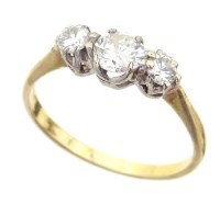 Lot 320 - 18ct gold three-stone diamond ring