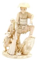 Lot 382 - Ivory figure group of a fisherman and children