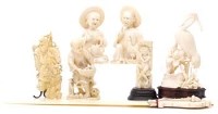 Lot 387 - Three ivory figures, egret, paper knife and two others